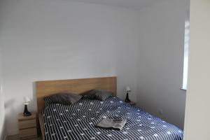 Postel nebo postele na pokoji v ubytování Apartament Fibra Freddo