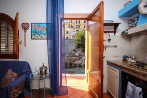 Kuchyň nebo kuchyňský kout v ubytování Casa Buscarini + 43 fotografií