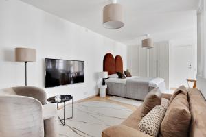 Posezení v ubytování Sanders City - Popular One-Bedroom Apartment In the Lovely Capital