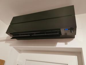 TV a/nebo společenská místnost v ubytování Apartma Auriga