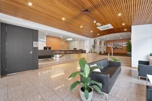 Kuchyň nebo kuchyňský kout v ubytování Allurity Hotel