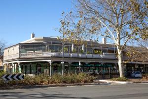 a building on the side of a street at Charm on Carrington in Adelaide