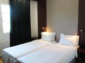 Postel nebo postele na pokoji v ubytování Place Lund