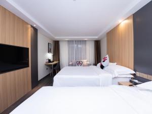 Postel nebo postele na pokoji v ubytování Country Inn&Suites by Radisson, Shanghai PVG + 37 fotografií