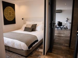 Postel nebo postele na pokoji v ubytování TERRASSE PROVENCE PAGNOL*****