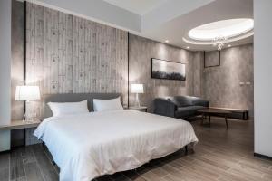 A bed or beds in a room at Meets Anping