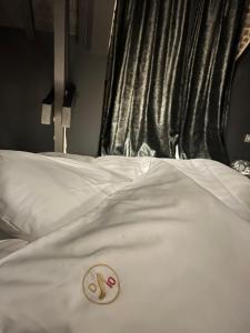 Postel nebo postele na pokoji v ubytování Domaine 10