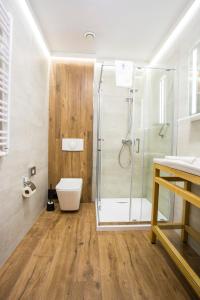 Kylpyhuone majoituspaikassa Hotel Promyk Wellness & Spa