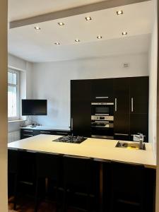 Kuchyňa alebo kuchynka v ubytovaní Apartament 52 City Center