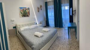 Posteľ alebo postele v izbe v ubytovaní Catania Apartment Borgo Suite Autonomous