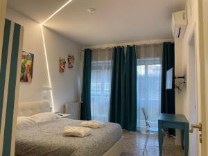 Posteľ alebo postele v izbe v ubytovaní Catania Apartment Borgo Suite Autonomous
