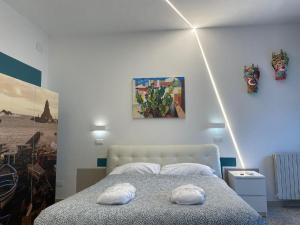 Posteľ alebo postele v izbe v ubytovaní Catania Apartment Borgo Suite Autonomous
