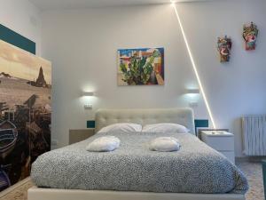 Posteľ alebo postele v izbe v ubytovaní Catania Apartment Borgo Suite Autonomous