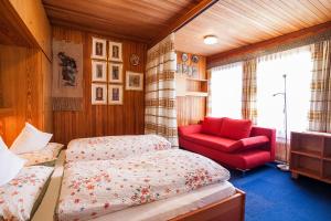 Posteľ alebo postele v izbe v ubytovaní Appartements Claudia