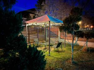A garden outside Attila Studio Apartments