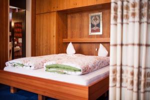 Posteľ alebo postele v izbe v ubytovaní Appartements Claudia