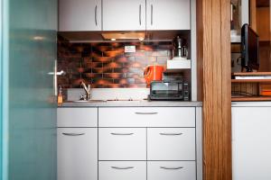 Kuchyňa alebo kuchynka v ubytovaní Appartements Claudia