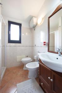 Ванна кімната в Villetta Turagri