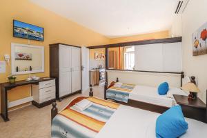 Kuchyň nebo kuchyňský kout v ubytování Mariblu Hotel