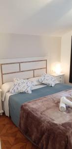 Postel nebo postele na pokoji v ubytování Apartamento ático en Sanxenxo a 160 m de Playa Silgar