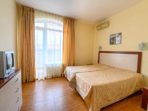 Postel nebo postele na pokoji v ubytování Apartcomplex Panorama Dreams