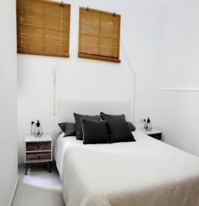 Posteľ alebo postele v izbe v ubytovaní Twins' Home Chancillería, Jerez Centro, Cádiz, wifi
