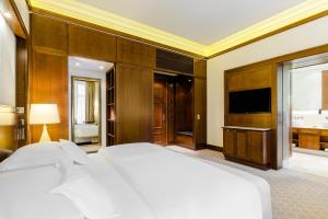 Postel nebo postele na pokoji v ubytování Excelsior Hotel Ernst am Dom
