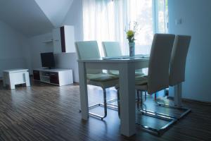 Televízia a/alebo spoločenská miestnosť v ubytovaní Guest House Buk Rastoke