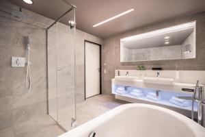 Vannituba majutusasutuses aDLERS Hotel Innsbruck