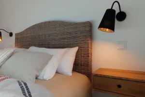 A bed or beds in a room at Molino Mellado