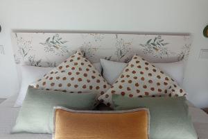 A bed or beds in a room at Molino Mellado