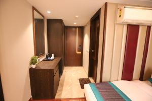 Rúm í herbergi á Hotel The Magic Tree - Paharganj New Delhi