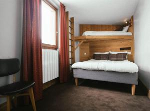 Postel nebo postele na pokoji v ubytování Langley Hôtel Victors