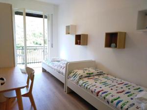 A bed or beds in a room at Villa Maremonti - con 3 piscine