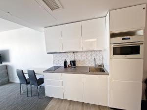 Kuchnia lub aneks kuchenny w obiekcie Seaside Park Private Apartment by Villmaris