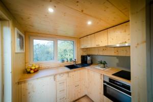Kuchyň nebo kuchyňský kout v ubytování Tiny House - Apfel