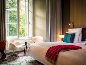 Cama ou camas em um quarto em SO/ Berlin Das Stue
