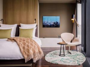 Cama ou camas em um quarto em SO/ Berlin Das Stue