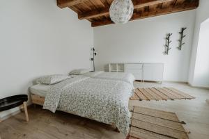 Postel nebo postele na pokoji v ubytování Casa Botár Vendégház