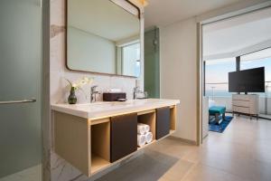A television and/or entertainment centre at Radisson Hotel Danang
