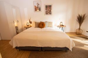 Postel nebo postele na pokoji v ubytování Hotel Hofgut Imsbach Lapointe