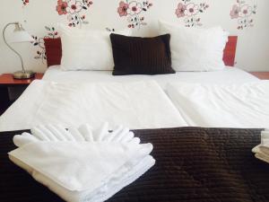 Posteľ alebo postele v izbe v ubytovaní Canada Hotel Budapest