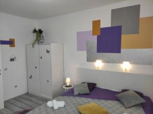 Posteľ alebo postele v izbe v ubytovaní Apartman Iris s terasom