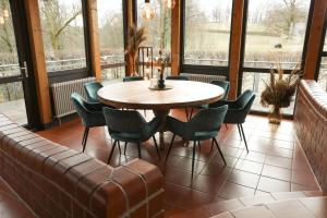 Posezení v ubytování Hotel Hofgut Imsbach Lapointe