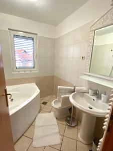 Kúpeľňa v ubytovaní Apartment Tina