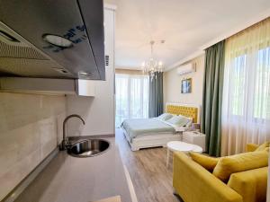 Μια τηλεόραση ή/και κέντρο ψυχαγωγίας στο Guest House Botanical Paradise