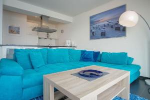 Χώρος καθιστικού στο Haus-Zur-Mole-Wohnung-12