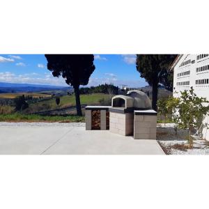 Balkón alebo terasa v ubytovaní Villa Casa Collina Castelfalfi with amazing salt waterpool & AIRCO & VIP service