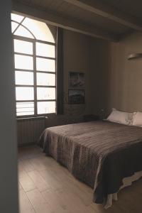 Postelja oz. postelje v sobi nastanitve Officina Suites - Apartment , Navigli, Bocconi, Movida, Porta Ticinese