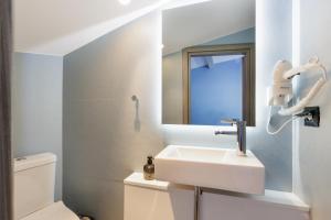 Koupelna v ubytování Vailato Loft Suites
